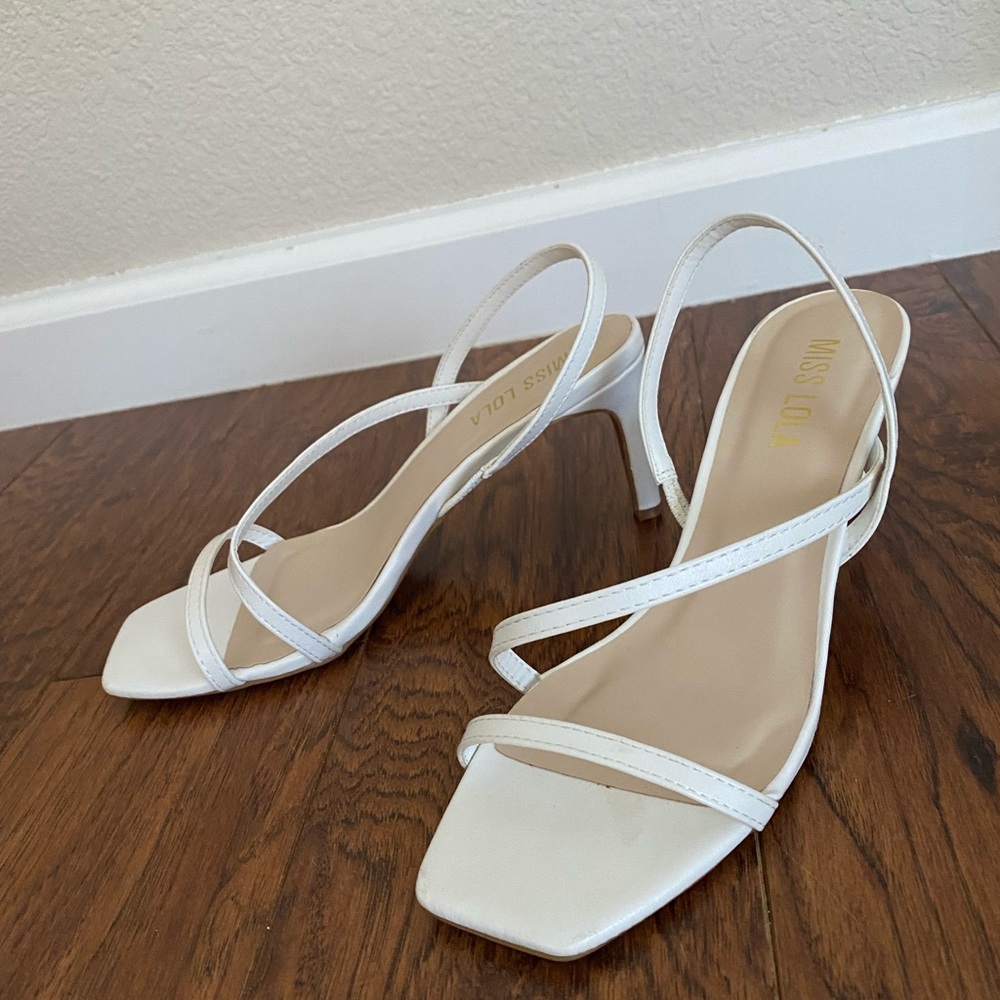 White women’s heels/sandals.